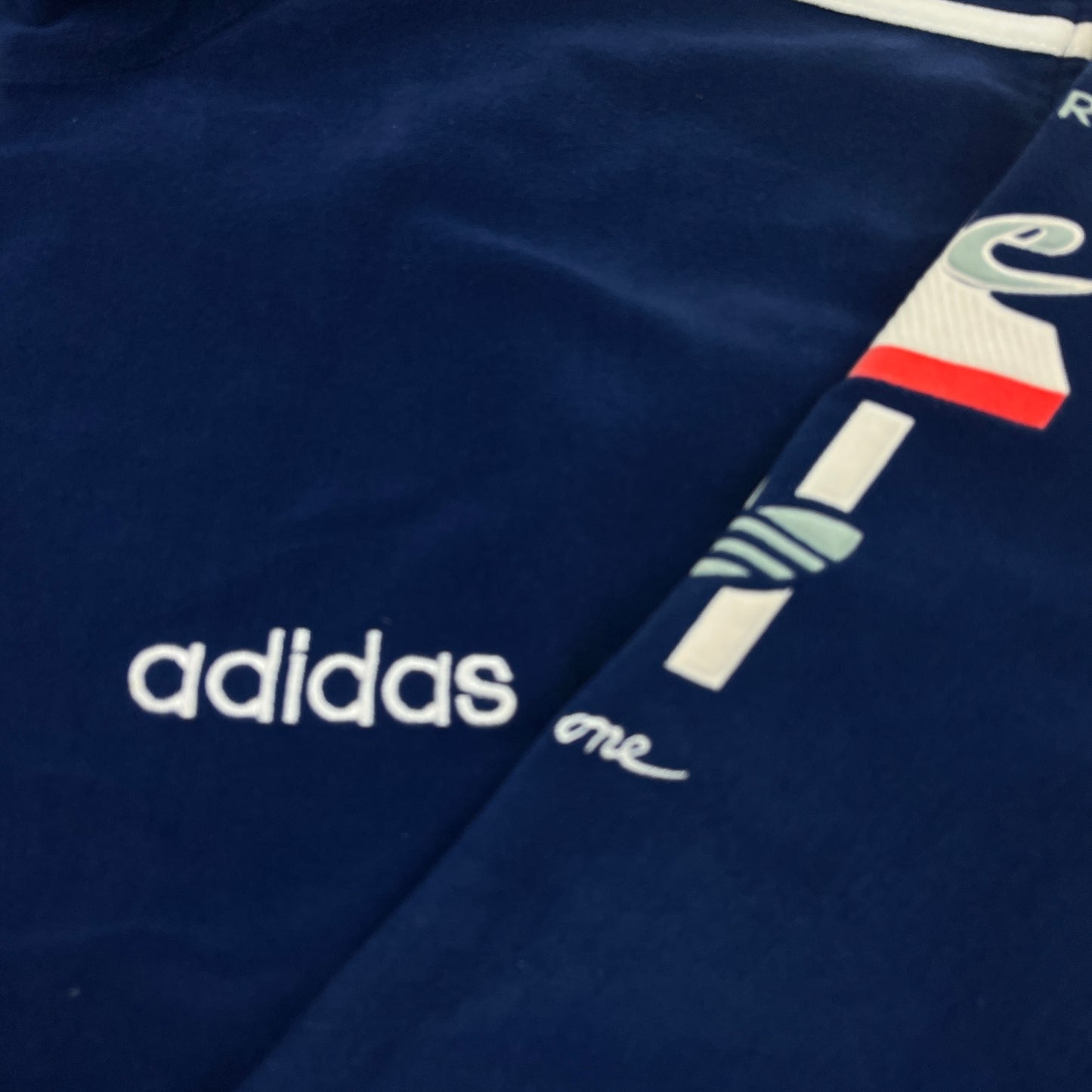 02386 Adidas 90s „Number one“ Tracktop
