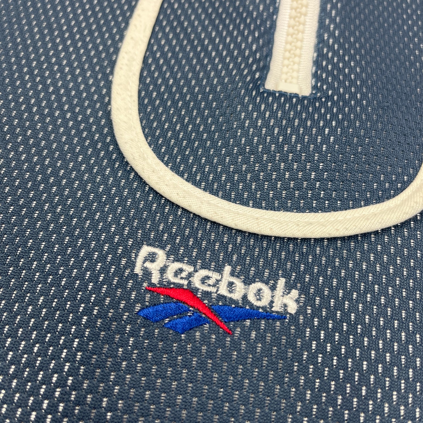 01864 Reebok 90s “Accessories” 1/4 zip Jersey